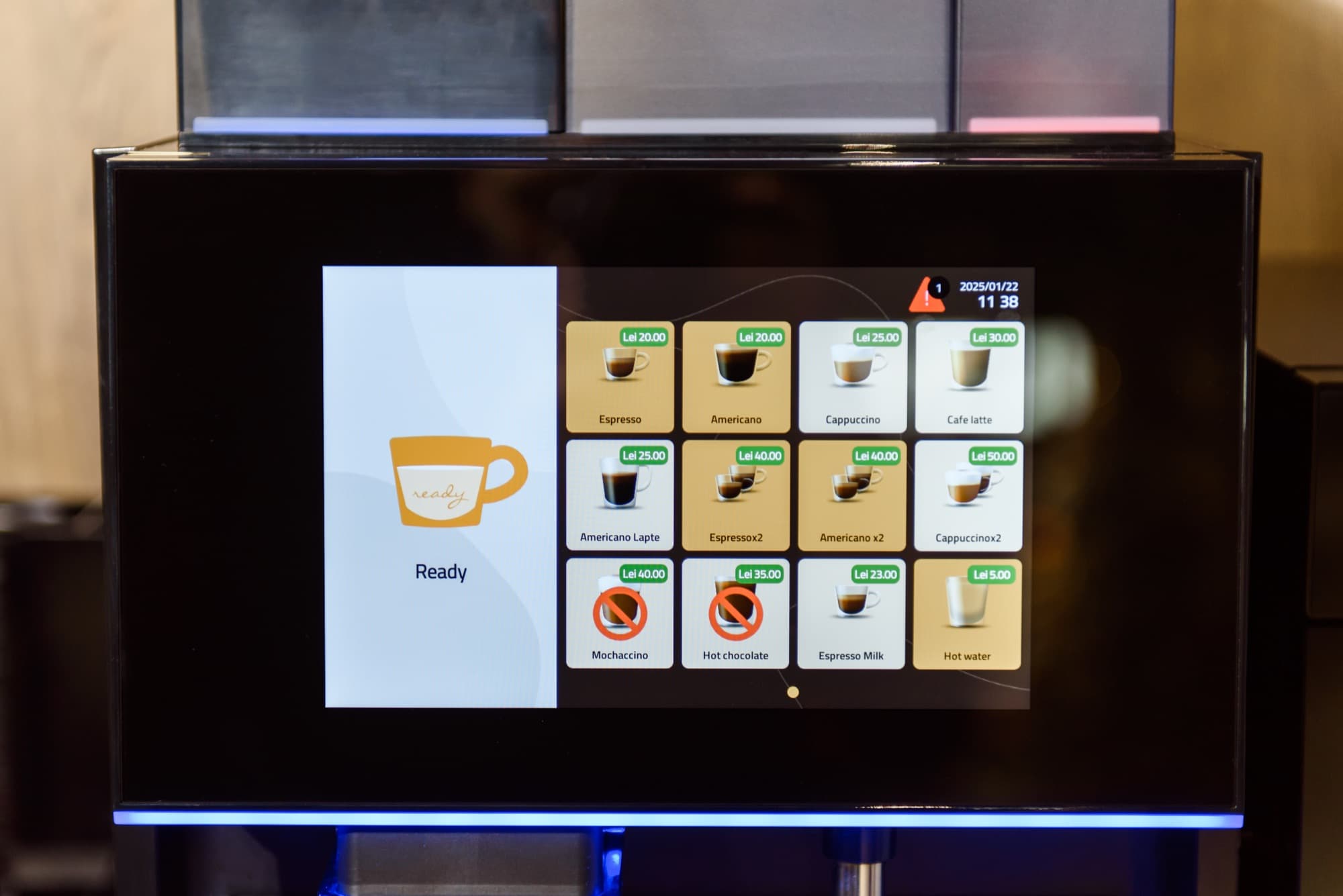 Meniul digital al espressorului, cu băuturi și prețuri
